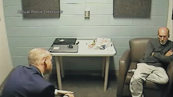 David Albert Miller (right) in the interrogation room.