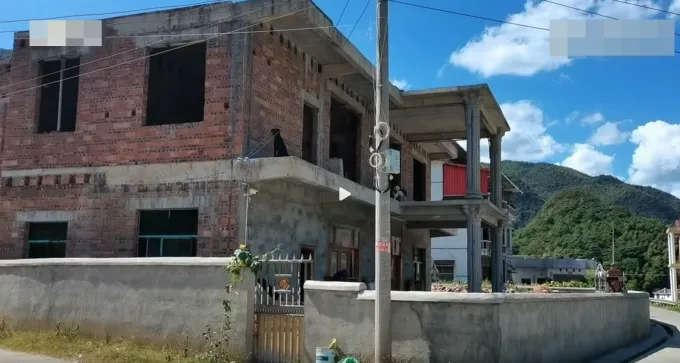 The two-story house Li Haiyu saved money to build for his younger brother